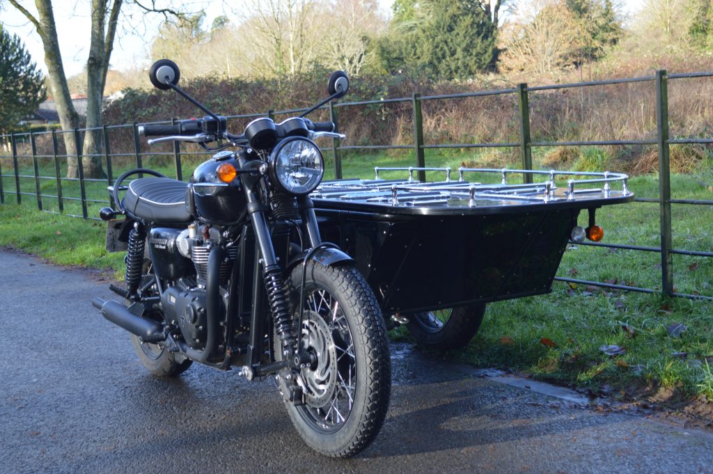 Picture of Triumph T120 Motorcycle Hearse with open hearse deck in Mote Park Maidstone Kent